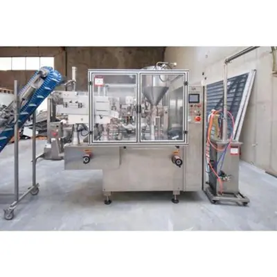 GF-400 Tube Filler/Sealer, rated 30-70 per minute