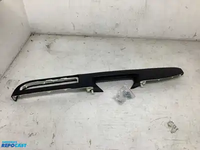 Lot of various car parts including Tesla storage bins, a sunroof deflector, mud flaps, a Colorado...