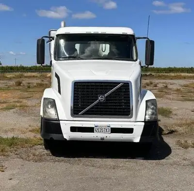 Used 2014 VOLVO VNL42300 Dump trucks California US | Ben Kaplan Equipment #1279509