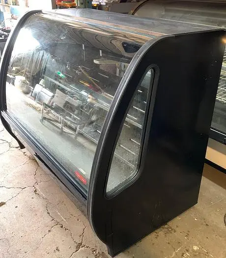 57" WIDE TOR REY CURVED GLASS SHOWCASE