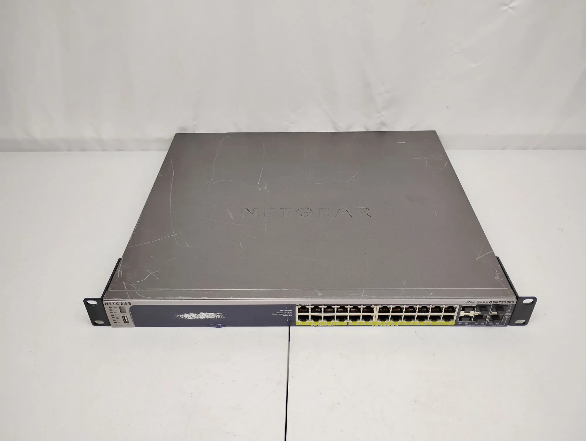 USED Netgear GSM7228PS