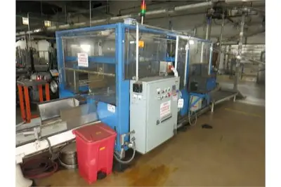Compacker EP 11-3 case packer with Nordson Hot Melt