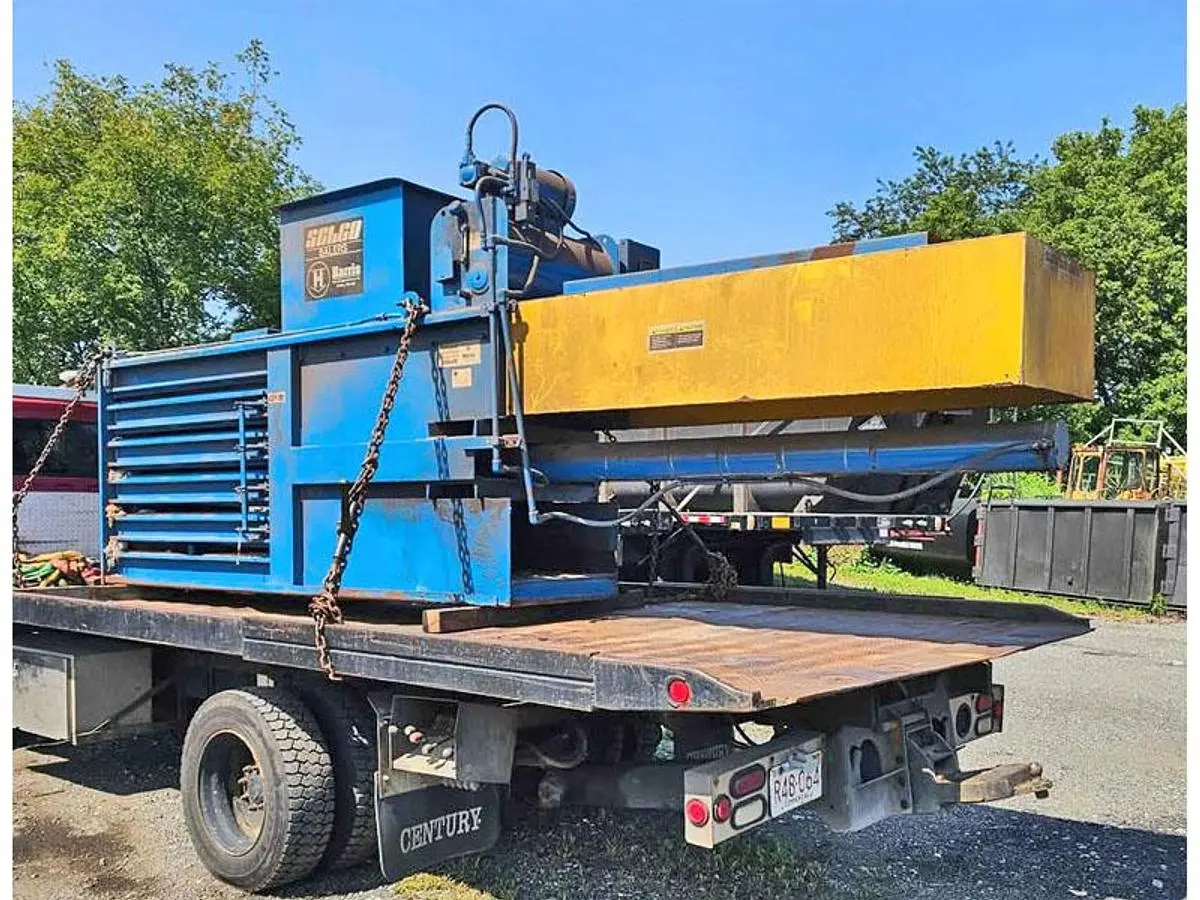 Selco Closed Door Baler with Conveyor