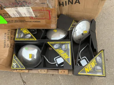 Skid of assorted truck parts included rear tail lights, (3) Sure Plus Hood Mounted Safety Mirrors, C...