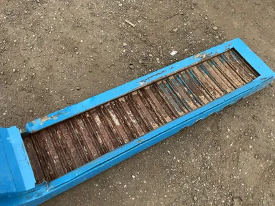 Chip Conveyor, 220/380 Volt 3 Phase Motor, approx. 88” long overall, 9” wide conveyor, Works