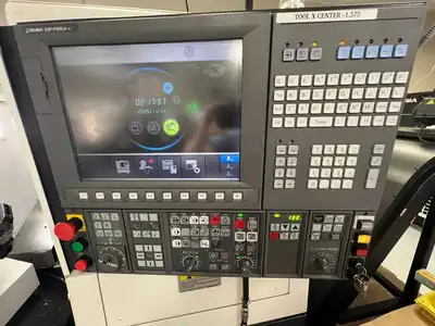 2021 OKUMA GENOS L3000-E Lathes, Bar, CNC | Machnet (8)