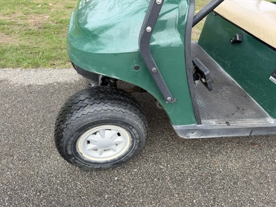 (1) 2015 E-Z-Go golf cart with a Kawasaki gas engine, does not include Club canopy, includes ball wa...