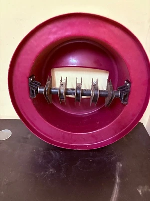 Trash can lid with magnetic silverware catcher