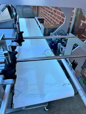 USED DORNER STAINLESS STEEL CONVEYOR INSPECTION MACHINE W/ OPTEL CONTROLLER