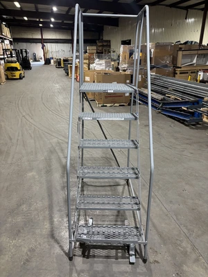 Uline - 6-Step Rolling Ladder - Bent Frame, requires repair

Seller will assist with loading.  Forkl...