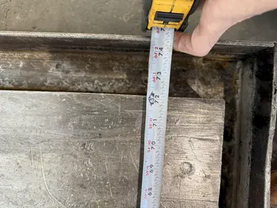 42" WIDE X 72" LONG X 6" THICK T-SLOTTED BOLSTER PLATE. STOCK # 1006324