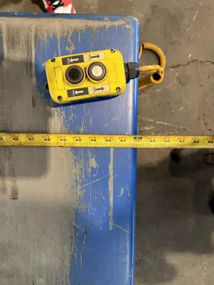 4,000 LB 48" X 48" HYDRAULIC TILT TABLE. STOCK # 1003725.