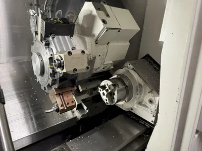 USED 2016 OKUMA GENOS L300MYW