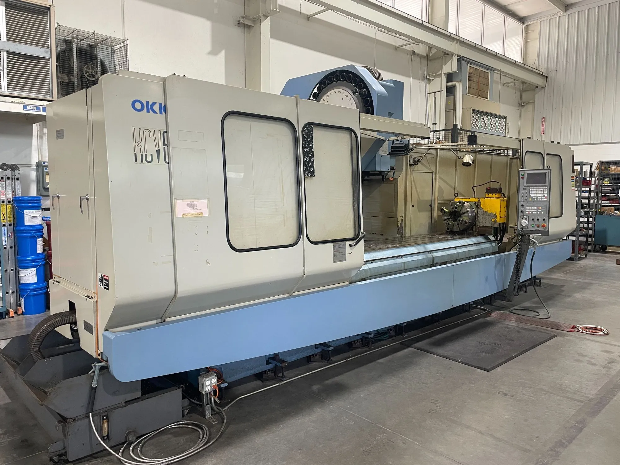OKK KCV 600-30L CNC Vertical Machining Center with 120" x 25.2" x 25.2" Travels