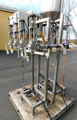 USED FOUR STATION VOLUMETIRIC FILLER FOUR STATION