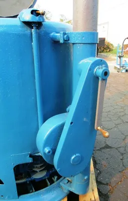 Barrett 1101-E spindle post type chip spinner with hoist.