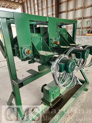 USED NEWMAN M-255 AUTOMATIC FEED TABLE