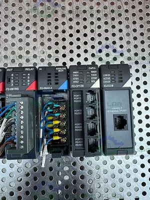 USED AUTOMATION DIRECT LOGIC 205 KOYO W/ F2-CP128, H2-ECO M MODULES