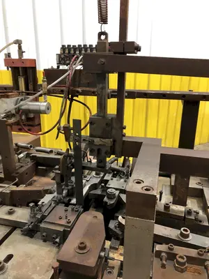 FOUR SLIDE WIRE FORMING MACHINE: STOCK #18987