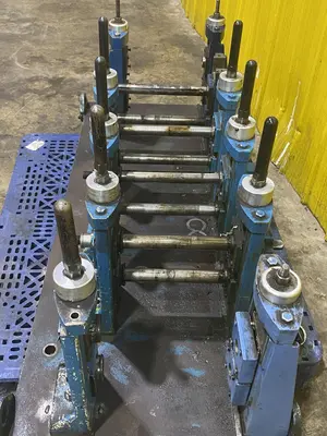 4 STAND X 1.5" X 11" YODER ROLLFORMER STANDS ON 6 STAND RAFTED BASE: STOCK #16781