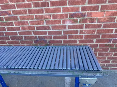 USED ROLL-AWAY HEAVY DUTY ROLLER CONVEYOR 10' X 18" W/ ADJUSTABLE LEGS
