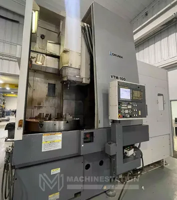 USED 2011 OKUMA VTM-100