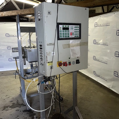 6 Head ELF Filler with feed tanks & container link belt conveyor