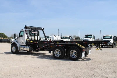 New | in-Stock 2027 PETERBILT 548 Rolloff Trucks Texas US | Roll Off Truck World #1492015