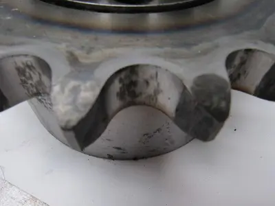 18 Tooth  100 Chain  2-3/4" Smooth Bore W/ built in Locking collar