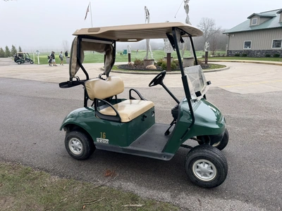 (1) 2015 E-Z-Go golf cart with a Kawasaki gas engine, includes ball washer and Club canopy, ball cov...