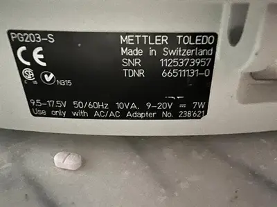 Mettler Toledo model PG203-S analytical scale with LV11 automatic feeder