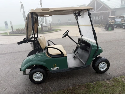 (1) 2015 E-Z-Go golf cart with a Kawasaki gas engine, includes canopy, ball cover, club cover, fold-...