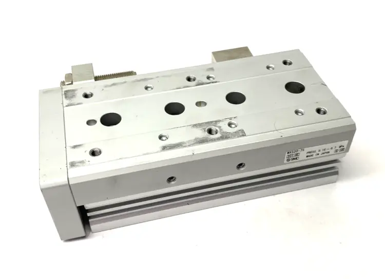 Used SMC GUIDED SLIDE TABLE CYLINDER, 20MM BORE, 75MM STROKE ADJUSTABLE Pneumatic Cylinders Michigan US | Maverick Industrial Sales #1089045