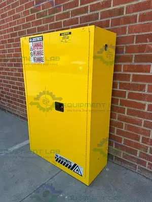 USED JUSTRITE 45 GALLON FLAMMABLE LIQUID STORAGE CABINET W/ SOFT CLOSE DOORS, KEY