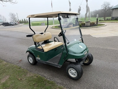(1) 2015 E-Z-Go golf cart with a Kawasaki gas engine, does not include Club canopy, includes ball wa...