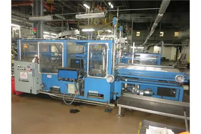 Compacker EP 11-3 case packer with Nordson Hot Melt