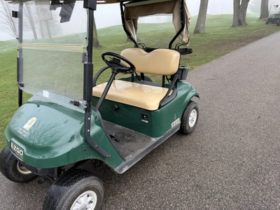 (1) 2015 E-Z-Go golf cart with a Kawasaki gas engine, includes canopy, fold-down windshield, and bal...