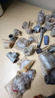 Lot of Plumbing Hardware and Fittings including Galvanized Nipples, Elbows, Valves, and Connectors