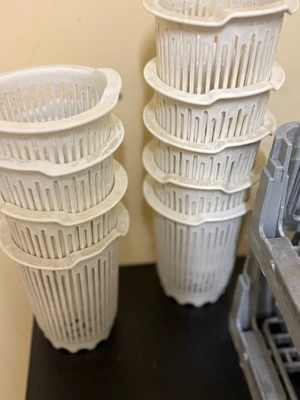 set of dishwasher racks and silverware holders