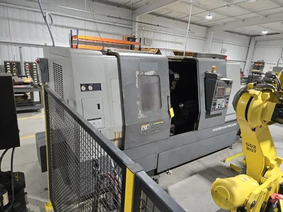 Hyundai SKT-400C F21ITB CNC Lathe w/ Tailstock and Indexer, 10 Slot Turret, LNS Conveyor, 3-Jaw