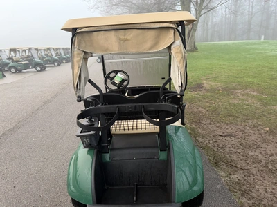 (1) 2015 E-Z-Go golf cart with a Kawasaki gas engine, includes canopy, ball cover, club cover, fold-...