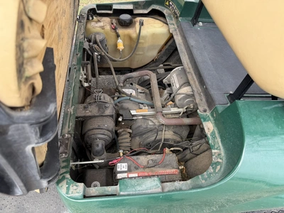 (1) 2015 E-Z-Go golf cart with a Kawasaki gas engine, does not include Club canopy, includes ball wa...