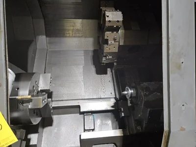 Hyundai SKT-400C F21ITB CNC Lathe w/ Tailstock and Indexer, 10 Slot Turret, LNS Conveyor, 3-Jaw