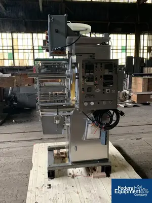 USED Wrapade Wrap-Ade Strip Packer, Model UPH310