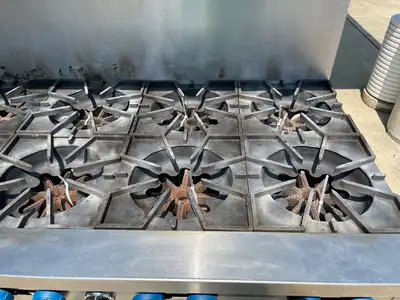 Used Comstock Castle Used Comstock-Castle 2F330 72" NG Range Cooktop w/ 12 Burners and 2 Ovens Commercial Ranges Illinois US | Falcon Restaurant Supply #1376040