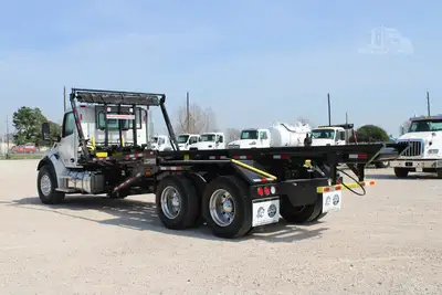 New | in-Stock 2027 PETERBILT 548 Rolloff Trucks Texas US | Roll Off Truck World #1492019