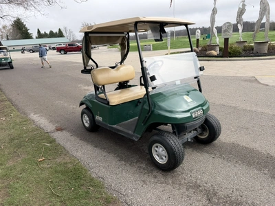 (1) 2015 E-Z-Go golf cart with a Kawasaki gas engine, includes Club canopy and ball washer, fold-dow...