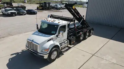 New | in-Stock 2027 PETERBILT 548 Rolloff Trucks Texas US | Roll Off Truck World #1492012