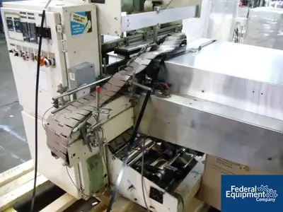 USED OMEGA OMEGA SHRINK BUNDLER, MODEL DL 27