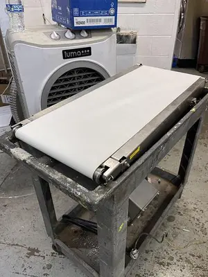 USED CONVEYOR CONVEYOR 31 1/2” LONG BY 11 3/4” WIDE